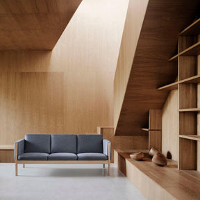 Wegner CH163 Sofa in wood paneled architect's loft Carl Hansen and Son