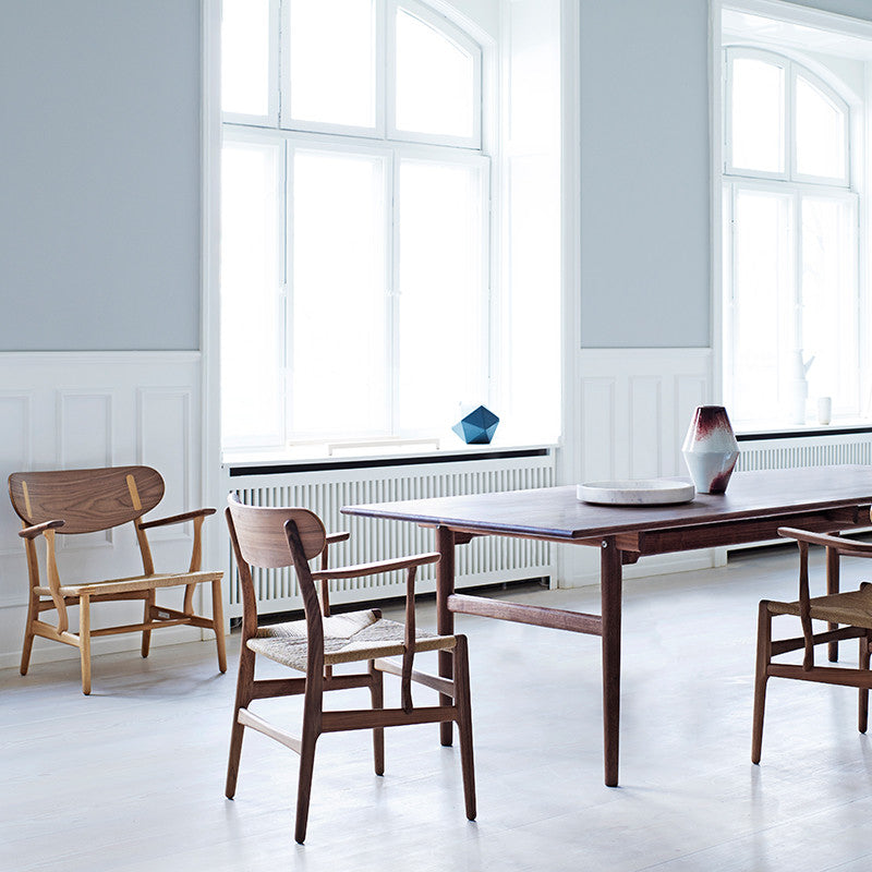 Wegner CH22 Lounge Chair in Room with CH27 Dining Chairs and Table by Carl Hansen and Son