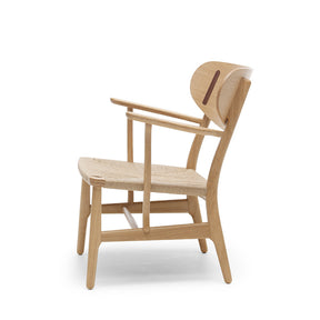 Wegner CH22 Lounge Chair in Oak and Walnut in Profile by Carl Hansen and Son