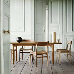 Wegner CH23 Oak and Walnut Chairs in Room with Dining Table Hansen and Son
