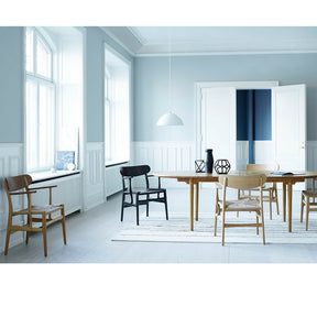 Wegner CH26 Dining Chairs in Dining Room with Woodlines Rug Carl Hansen & Son