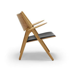 Wegner CH28 Sawhorse Chair Oak with Black Leather Side Carl Hansen & Son