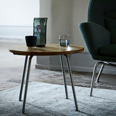 Hans Wegner CH415 Side Table in room with Oculus Chair Carl Hansen and Son