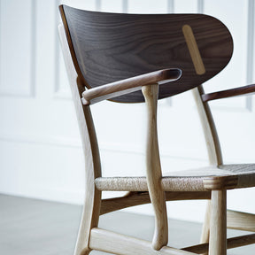 Wegner CH22 Lounge Chair in Walnut and Oak Closeup by Carl Hansen and Son
