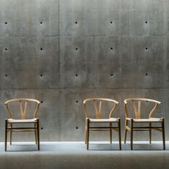 Wegner Wishbone Chairs in Arken with Concrete Walls