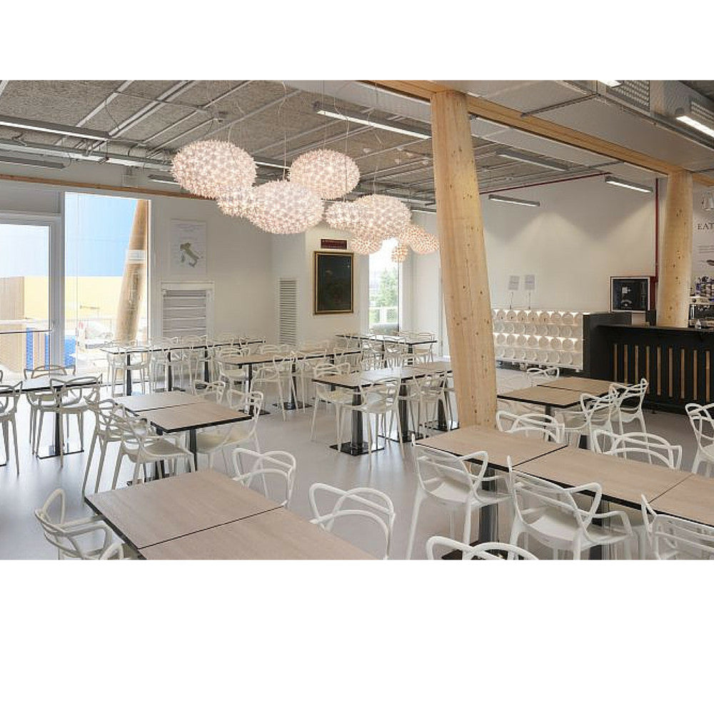 White Masters Chairs in Restaurant Philippe Starck for Kartell.