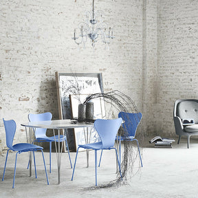 Fritz Hansen Super Elliptical Table in Room with Monochrome Trieste Blue Series 7 Chairs